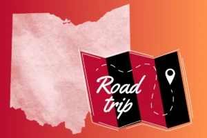 outline of the state of ohio with a road trip map in front in red and black colors depicting our ultimate cannabis road trip