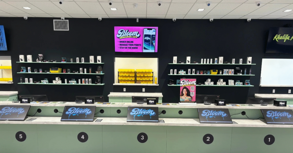 Modern dispensary interior with products displayed.