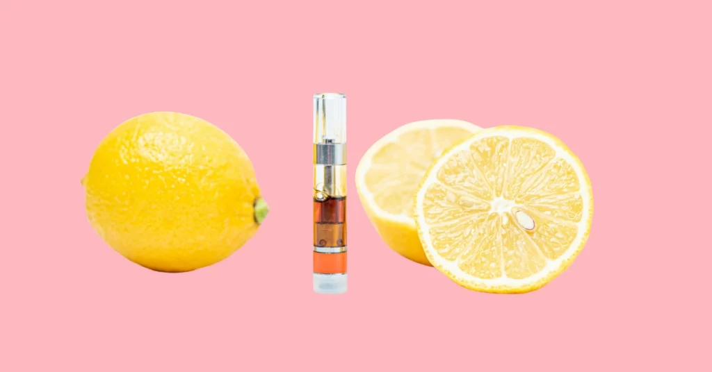 cannabis vape cart between two lemons signifying the limonene terpene in cannabis products
