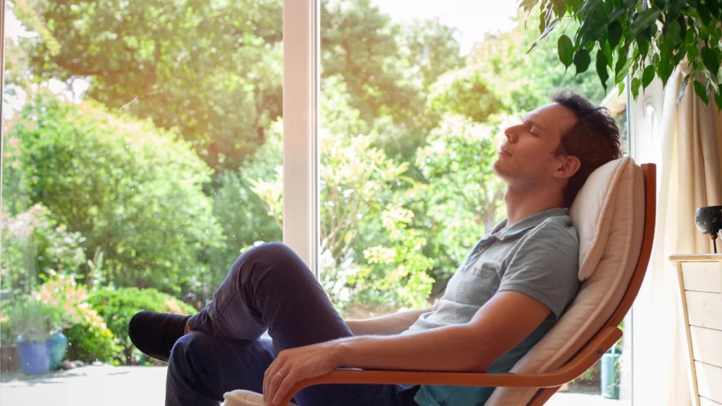 man relaxing on chair sobering up from cannabis use